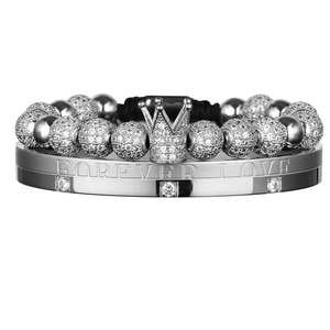 Detail of silver crown bead bracelet and Forever Love engraved bangle with zircons