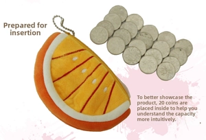 Detail of plush orange slice coin purse with bead chain and zipper showing compact capacity
