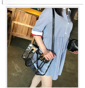 Transparent PVC tote bag with black faux leather trim and a matching inner pouch
