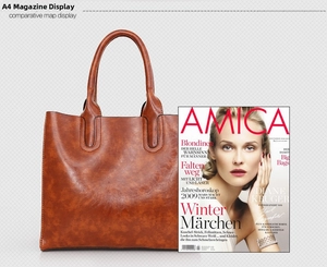 Brown oil wax leather tote bag shown with an A4 magazine for size comparison