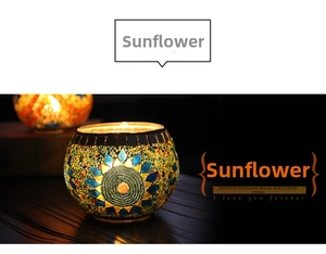 Close-up of handmade mosaic glass candle holder with colorful sunflower pattern