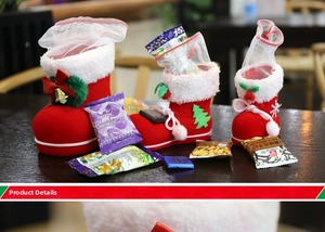Detailed view of three red flocked Christmas boots in different sizes for gift packaging