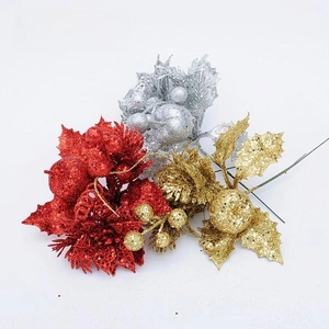 Detail of glittered red, gold, and silver Christmas berry stems for holiday floral decor