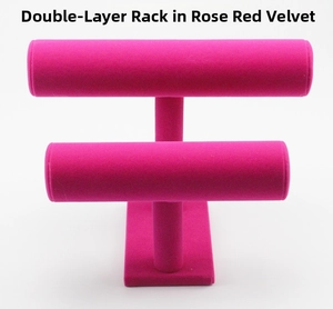 Close-up of a double-layer rose red velvet jewelry stand for bracelets and watches