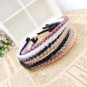 Close-up of sparkling multi-color crystal beaded headbands with non-slip lining