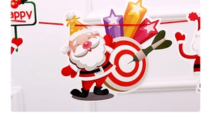 Detail of paper Christmas banner featuring a cartoon Santa Claus and red hanging string