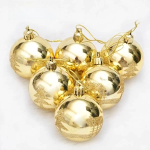 Detail of 6cm golden Christmas ball ornaments with glitter cedar tree patterns and strings