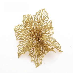 Close-up of a 14cm hollow gold glitter poinsettia flower for Christmas tree decoration