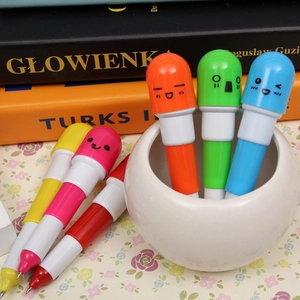 Close-up of cute cartoon pill-shaped retractable ballpoint pens in vibrant multiple colors
