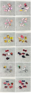 Detail of children's hair clips showing diverse cute shapes and metal alligator clip backs