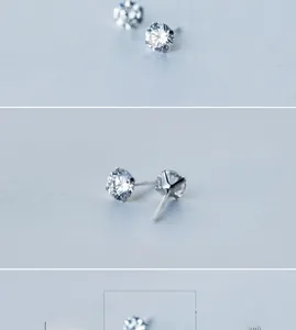 Detail showing various sizes of 5mm and 6mm four-prong Moissanite silver stud earrings
