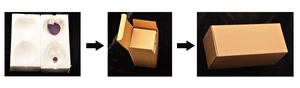 Detail showing the magnetic hourglass securely packed in foam and a sturdy shipping box