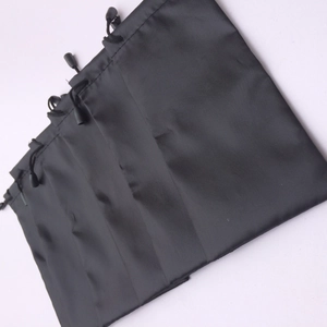 Multiple black EVA sunglasses pouches with drawstrings and adjustable toggles on white background