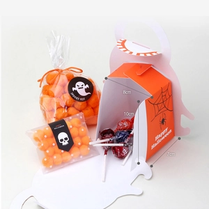 Detailed view of Halloween pumpkin gift boxes and spooky ghost candy bags set