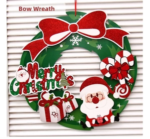 Detail of 3D paper Christmas wreath with glitter bow and Santa Claus hanging ornament