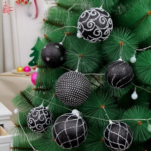 Detail of 8cm black Christmas balls with silver glitter snowflakes and rhinestone patterns
