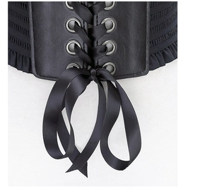 Close-up detail of the black wide elastic corset belt showcasing metallic grommets and bow.