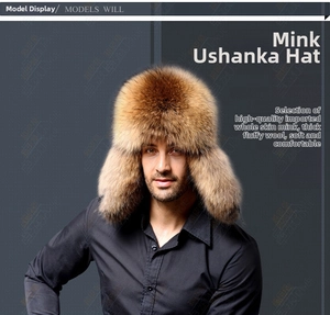 Close-up of thick brown raccoon fur trapper hat with protective ear flaps for winter