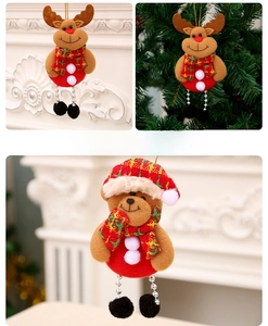 Plush Christmas bear and reindeer ornaments with plaid scarves hanging on a decorated tree