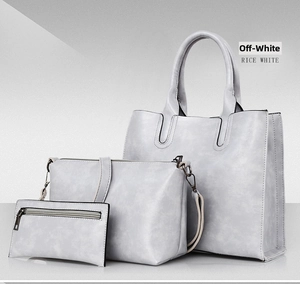 Detailed view of three-piece rice white tote bag set with matte cloud texture finish