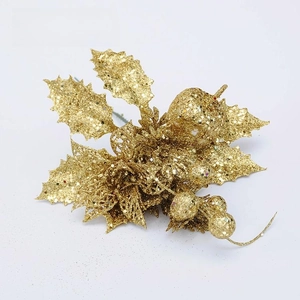 Glitter gold Christmas spray detail with holly leaves and berry picks for festive floral decor