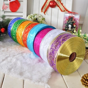 Christmas ribbon set with gold swirl patterns in nine vibrant colors for gift wrapping
