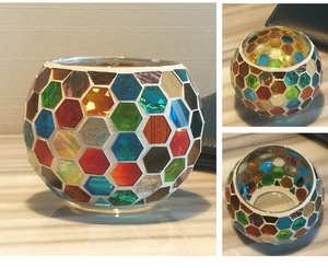 Detailed views of a mosaic glass candle holder with multicolored hexagonal tiles