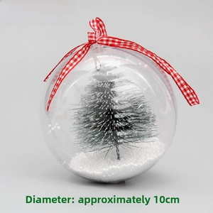 Detailed view of 10cm clear Christmas ball with miniature snowy tree and red plaid bow