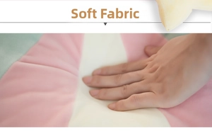 Macro detail of ultra-soft multi-color plush fabric being pressed to show elasticity