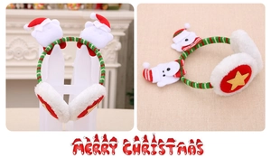 Detail of Christmas reindeer ear muffs with cute polar bears and plush warm texture