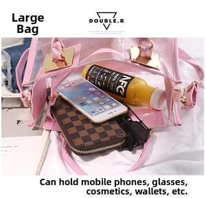 Macro view of the large pink transparent PVC tote bag showing spacious interior storage capacity