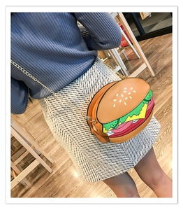 Detailed back view of a model wearing a creative hamburger-shaped chain crossbody bag
