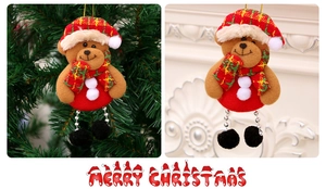 Detail of plush Christmas bear ornament with red plaid hat hanging on a tree