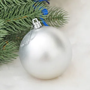 Silver matte Christmas ball ornament with hanging string for holiday tree decoration