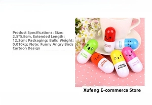 Detailed view of colorful cartoon pill-shaped retractable ballpoint pens with facial expressions