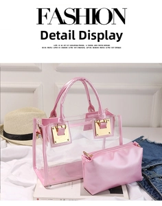 Pink transparent jelly tote bag with interior leather pouch on casual summer background