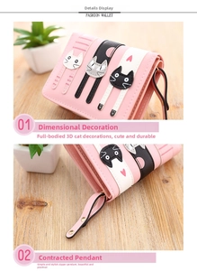 Detailed view of pink three-fold cat wallet featuring a golden zipper pull on a wooden desk