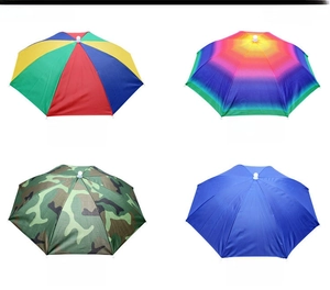 Detail showing four styles of umbrella hats: watermelon, rainbow, camouflage, and royal blue
