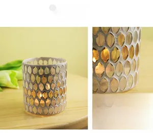 Detail of apricot mosaic glass candle holder with handcrafted diamond tile pattern