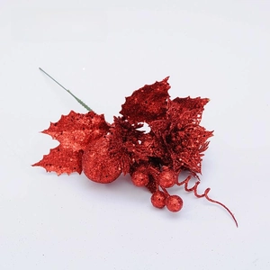 Detail of red Christmas pick with glitter holly leaves and berries for holiday decor