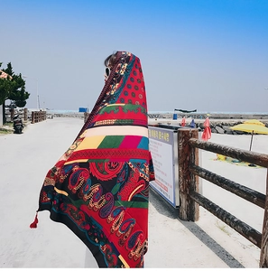 Close-up of lightweight bohemian paisley print shawl for beach sun protection
