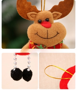 Detail of plush reindeer Christmas ornament with red nose and checkered scarf decoration