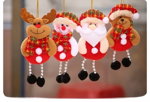 Set of four plush Christmas ornaments featuring Santa, snowman, elk and bear characters