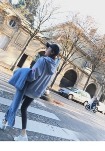Sky blue oversized hoodie featuring a unique colorful flag patch on the sleeve detail