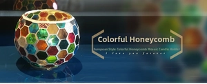 Detail of European mosaic glass candle holder with colorful honeycomb hexagonal patterns