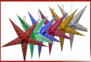Detail of colorful laser paper star lanterns with moon and stars cutout patterns