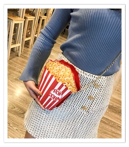 Creative popcorn bucket crossbody bag with red and white stripes and metal chain