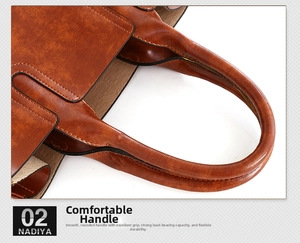 Detail of rounded brown leather tote handle with neat stitching and black edge paint