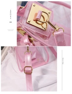 Detail of pink transparent jelly bag featuring golden metal buckle and PU leather strap