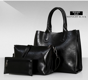 Midnight black oil wax leather handbag set with tote, crossbody bag and wallet details